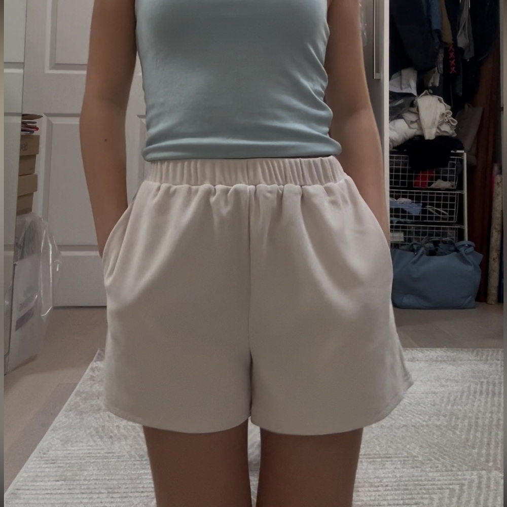 Cream and White Shorts in a size Small